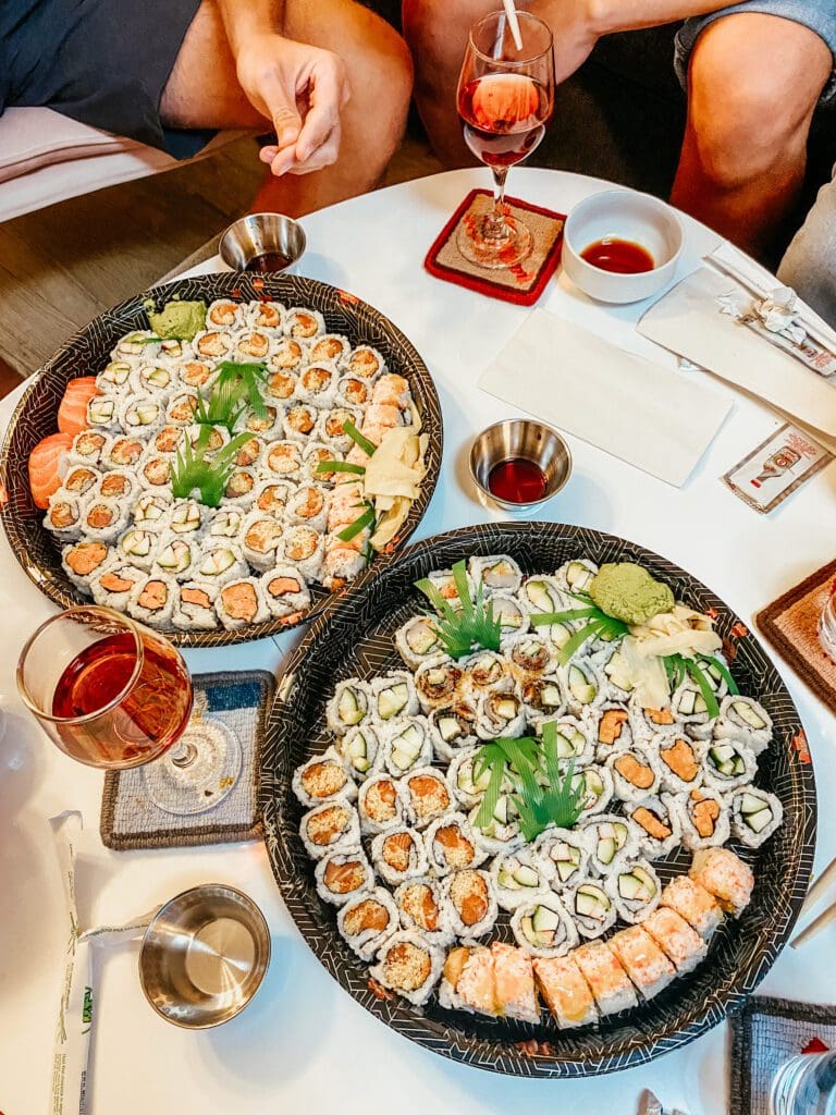 Two platters of maki sushi rolls - a delicious dinner of budget-friendly bites for the whole squad. 