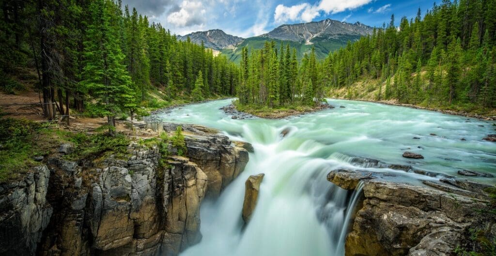 Another long drive from Calgary is the Sunwapta Falls near Jasper - but worth the trip to cross this Alberta waterfall off your summer bucket list