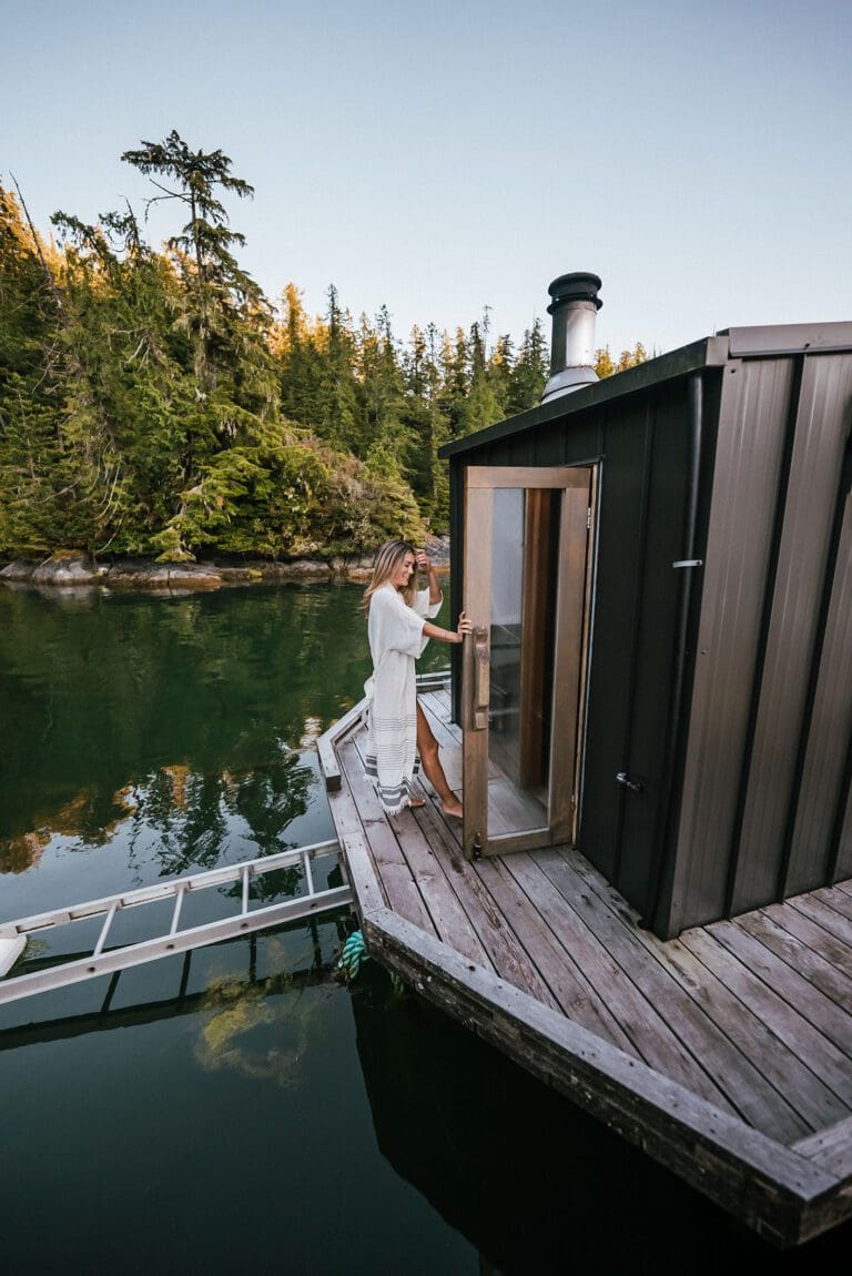 A girl walking into the sauna at the lagoon float camp.