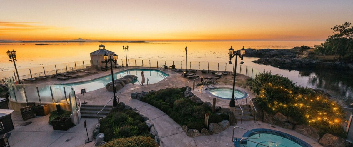 A sunrise over the pools at Oak Bay Beach Hotel