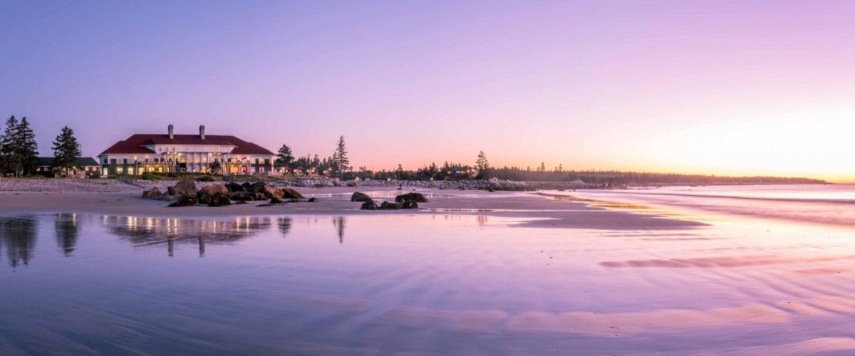 WhitePointBbeachResortatsunset-1-scaled